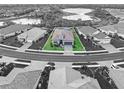 Aerial view of a single-Gathering home with a pool in a residential community at 10985 Trevino St, Englewood, FL 34223