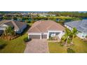 Single-Gathering home with a large driveway at 15048 Spanish Point Dr, Port Charlotte, FL 33981