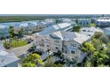 Aerial view of the property, highlighting its location within the community and architectural details at 10311 Lands End Cir # 13, Placida, FL 33946