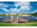 Private dock with boardwalk, offering direct water access at 15658 Stuart Cir, Port Charlotte, FL 33981