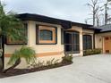 One-story home with attached garage and landscaping at 5160 Farewell St, Port Charlotte, FL 33981