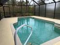 Screened-in, refreshing pool with a spa at 5160 Farewell St, Port Charlotte, FL 33981