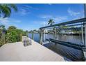 Private dock with boat lift and waterfront access at 12325 Mitchell Ter, Port Charlotte, FL 33981