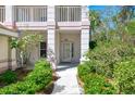 Condo entrance with walkway and manicured landscaping at 3113 Club Dr # 118, Port Charlotte, FL 33953