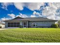 Single-story home with screened porch at 7006 Gunther St, Englewood, FL 34224