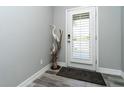 Bright entryway with tile flooring and decorative accents at 152 Apollo Dr, Rotonda West, FL 33947