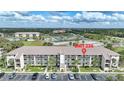 Aerial view of condo building, unit 236 highlighted at 175 Kings Hwy # 236, Punta Gorda, FL 33983