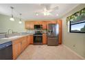 Modern kitchen with stainless steel appliances at 175 Kings Hwy # 236, Punta Gorda, FL 33983