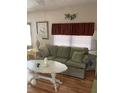 Relaxing living room, well-furnished and light-filled at 5560 Holiday Park Blvd, North Port, FL 34287