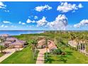 Luxury waterfront home with scenic water views and lush landscaping at 3031 Rivershore Ln, Port Charlotte, FL 33953