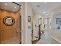 Interior view of a private elevator and hallway with hardwood floors at 10325 Longshore Rd # 20, Placida, FL 33946