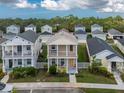 Two-story house in a community with other similar houses at 12753 Sagewood Dr, Venice, FL 34293