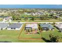 Property view showcasing home and expansive lot in community at 289 White Marsh Ln, Rotonda West, FL 33947