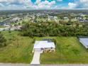 Single-story home with pool and spacious lot at 6 Tournament Rd, Rotonda West, FL 33947