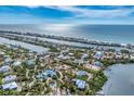 Aerial view of coastal community near the ocean at 141 Gasparilla Way, Placida, FL 33946