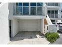 Private one-car garage with stairs to unit above at 2255 N Beach Rd # 9, Englewood, FL 34223