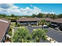 Aerial view of the community showing building and parking at 1531 Placida Rd # 201, Englewood, FL 34223