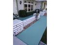 Inviting front walkway with brickwork and landscaping at 3090 Lockwood St, Port Charlotte, FL 33952