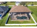 Home with a private screened pool and fenced backyard at 76 Long Meadow Ct, Rotonda West, FL 33947