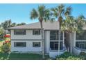 Building's aerial view showcasing its features and landscaping at 1515 Forrest Nelson Blvd # A 202, Port Charlotte, FL 33952