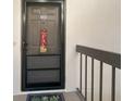 Condo's front door with a screen door at 1515 Forrest Nelson Blvd # A 202, Port Charlotte, FL 33952