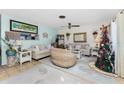Bright and airy living room with coastal decor and comfortable seating at 2495 Tenth St, Englewood, FL 34224