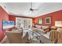 Spacious living room with access to a patio or balcony at 520 Pine Hollow Cir # 520, Englewood, FL 34223