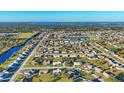 Aerial view showing community landscape and waterfront at 6358 Granger Rd, Port Charlotte, FL 33981