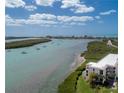 Aerial view of waterfront property and boats at 1751 Beach Rd # 204, Englewood, FL 34223