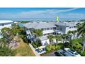 Coastal condo building with water views and parking at 5856 Gasparilla Rd # M27, Boca Grande, FL 33921