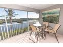 Relaxing balcony with water views and outdoor seating at 1401 S Mccall Rd # 306B, Englewood, FL 34223