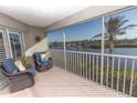 Spacious balcony offering tranquil water views at 1401 S Mccall Rd # 306B, Englewood, FL 34223