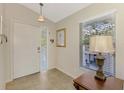 Bright and airy foyer with tiled floor at 14049 Willow Glen Ct # 242, Port Charlotte, FL 33953