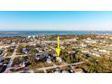 Aerial view of property, showcasing its position in a quiet residential area at 3150 Tenth St, Englewood, FL 34224