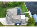 House with pool and boat, seen from above at 3431 Montgomery Dr, Port Charlotte, FL 33981