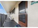Condo balcony with a door, providing access to the unit at 4260 Placida Rd # 14C, Englewood, FL 34224