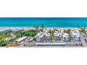 Aerial view of beachfront condo community with oceanfront access and parking at 2950 N Beach Rd # A315, Englewood, FL 34223