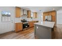 Modern kitchen with island and stainless steel appliances at 18399 Fremont Ave, Port Charlotte, FL 33954