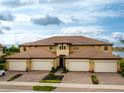 Luxury community home with three-car garage and tile roof at 23536 Awabuki Dr # 4B, Venice, FL 34293