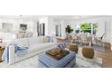 Bright, open-concept living room featuring stylish decor, modern lighting, and seamless flow to the kitchen and dining area at 2160 Palm Tree Dr, Punta Gorda, FL 33950