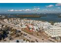 Aerial view showcasing the property's location near the water and neighborhood layout at 2255 N Beach Rd # 13, Englewood, FL 34223