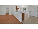 The expansive living room features stylish floors and a sun-filled dining area at 2495 De Garmo St, North Port, FL 34291