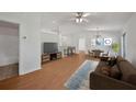 The expansive living room features stylish floors and furniture, plus abundant natural light at 2495 De Garmo St, North Port, FL 34291