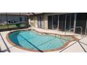 Sparkling screened pool area perfect for relaxation and entertainment at 95 Mark Twain Ln, Rotonda West, FL 33947