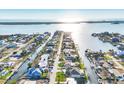 Scenic aerial shot of a waterfront neighborhood with canals and stunning coastal views at 1960 Mississippi Ave, Englewood, FL 34224