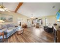 Inviting living room featuring hardwood floors and comfortable seating arrangement at 9423 El Campo Ave, Englewood, FL 34224