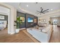 Bright and spacious living room featuring recessed lighting, modern decor, and a cozy fireplace at 1409 Remington Trace Dr, Port Charlotte, FL 33953