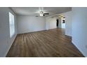 Spacious living room featuring modern flooring, fresh paint, and plenty of natural light at 192 Garden Nw Ave, Port Charlotte, FL 33952