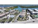 Beautiful aerial view of condo community with water access and close proximity to the beach at 2727 N Beach Rd # 113, Englewood, FL 34223