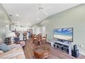 Inviting living room featuring an open floor plan, seamlessly connecting to the kitchen and dining area at 4260 Placida Rd # 8D, Englewood, FL 34224